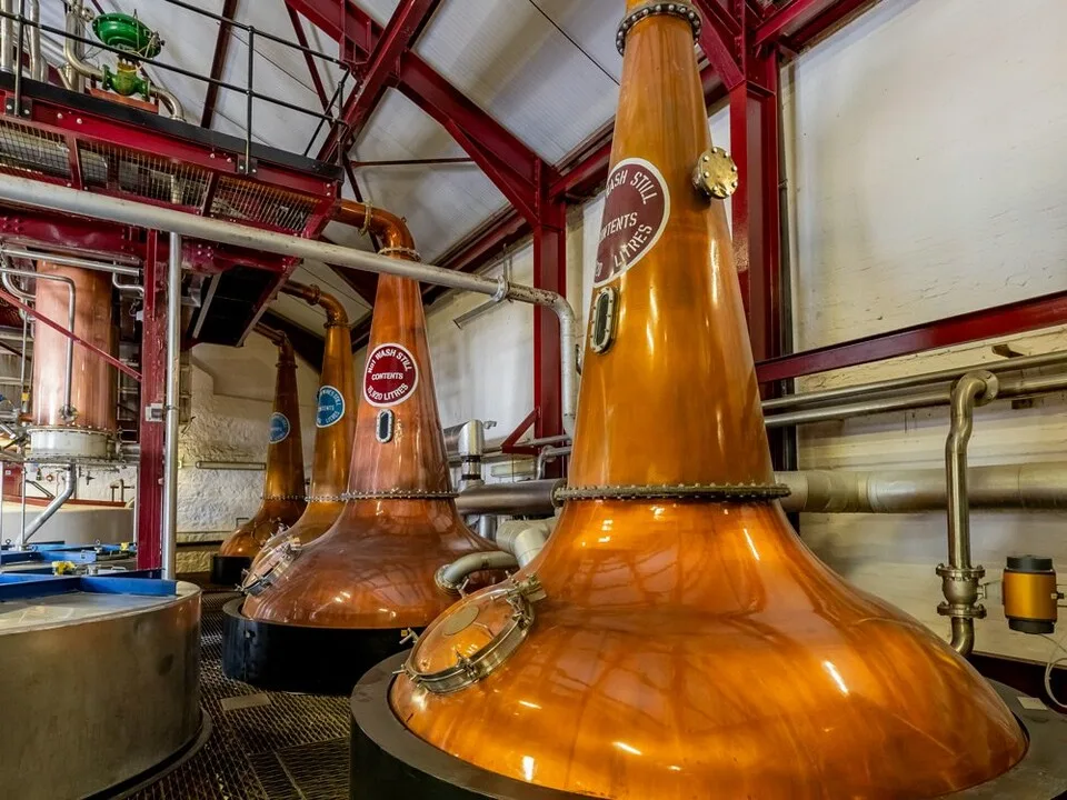 Copper pot stills at the Old Bushmills Distillery